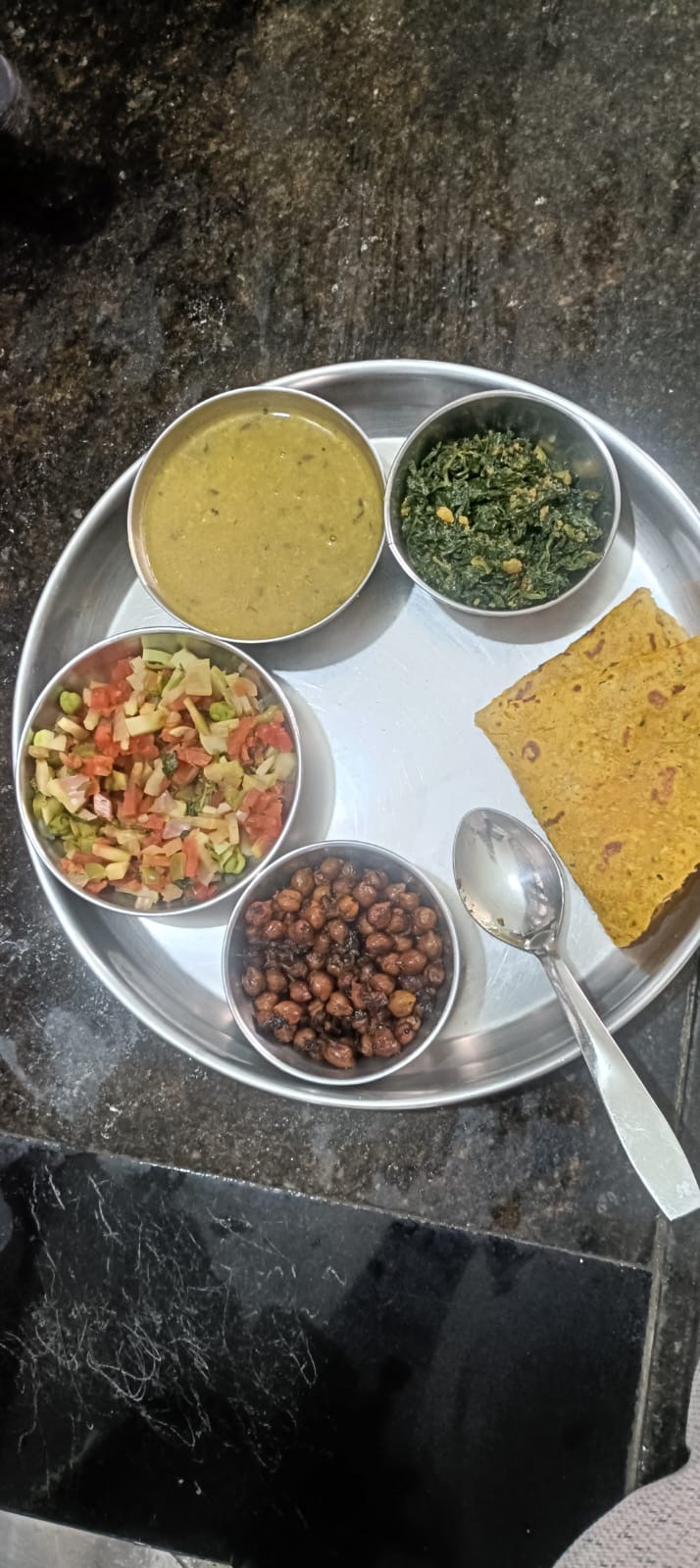 Full thali: dal, chana, greens, salad, cheela